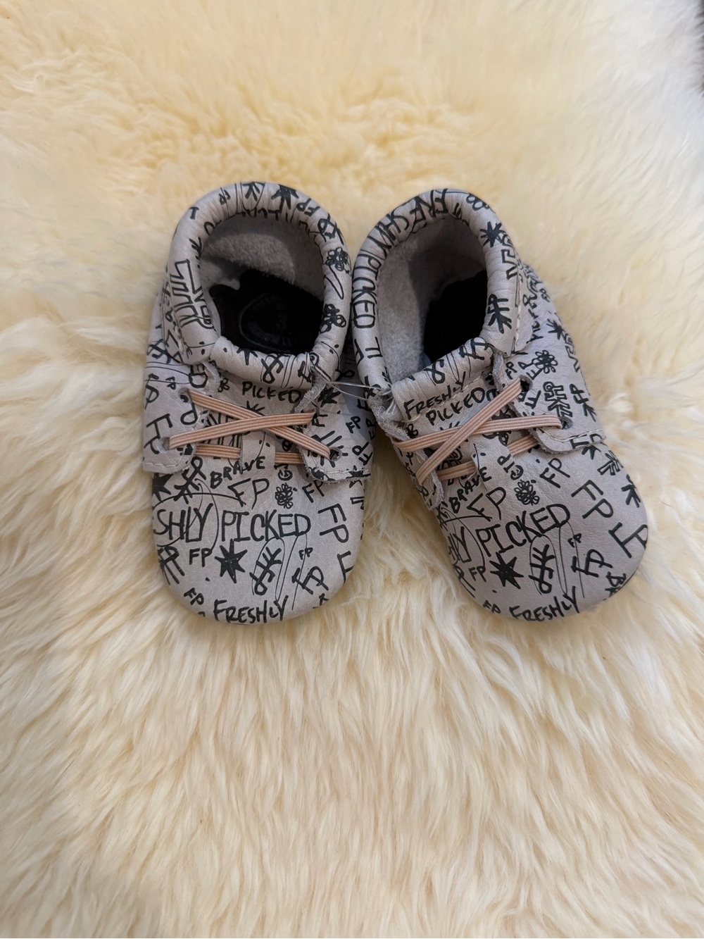 Freshly Picked White with Black Graphic Baby Moccasins